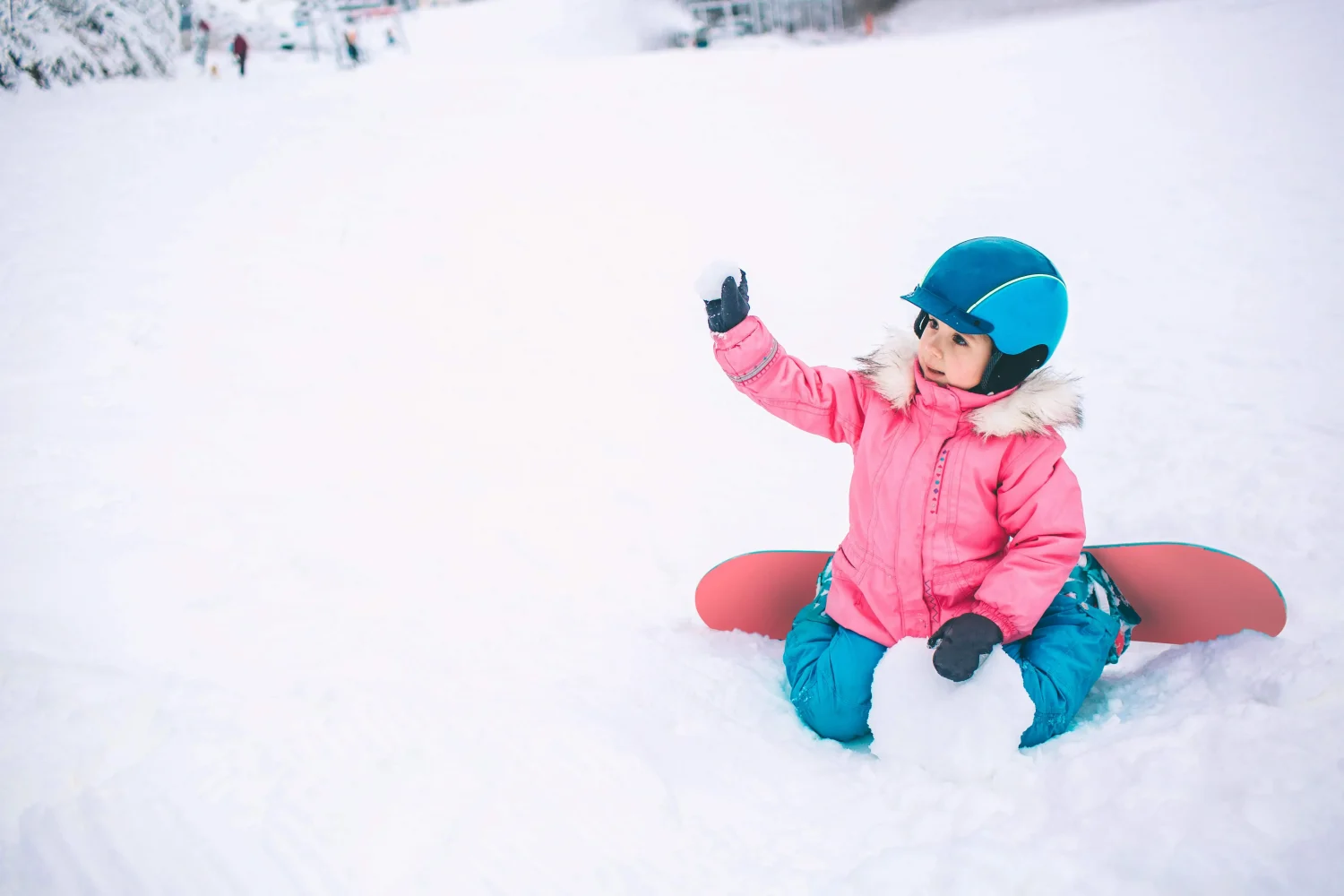 Child in colourful ski gear